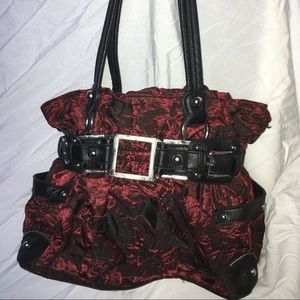 Wilson’s leather red and black scrunched vinyl